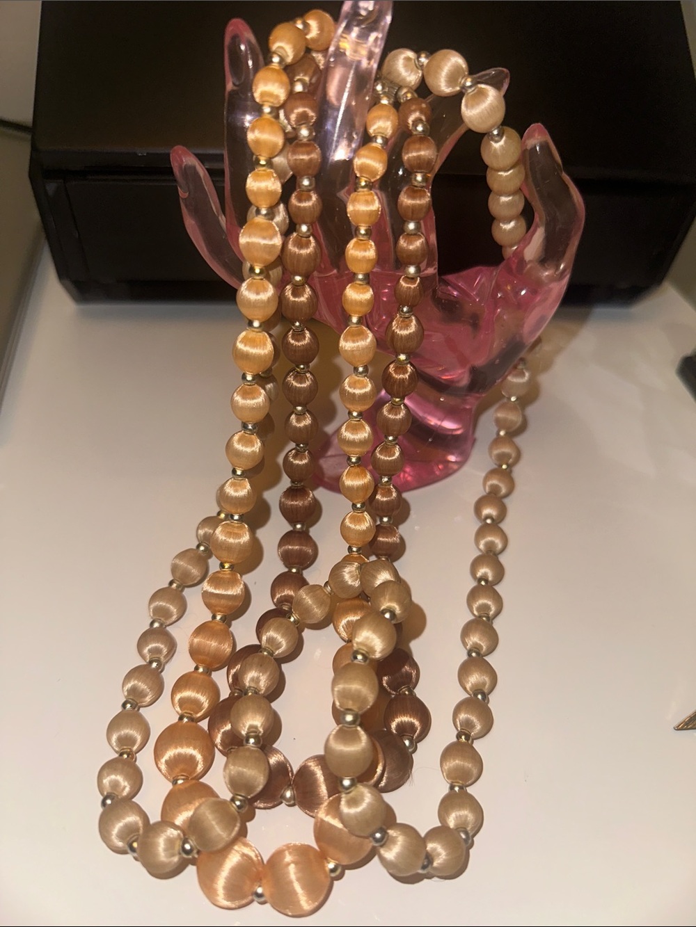 LOT 3STRANDS PINK SPUN THREAD w GOLD TONE SPACERS  NECKLACES. 
Like New